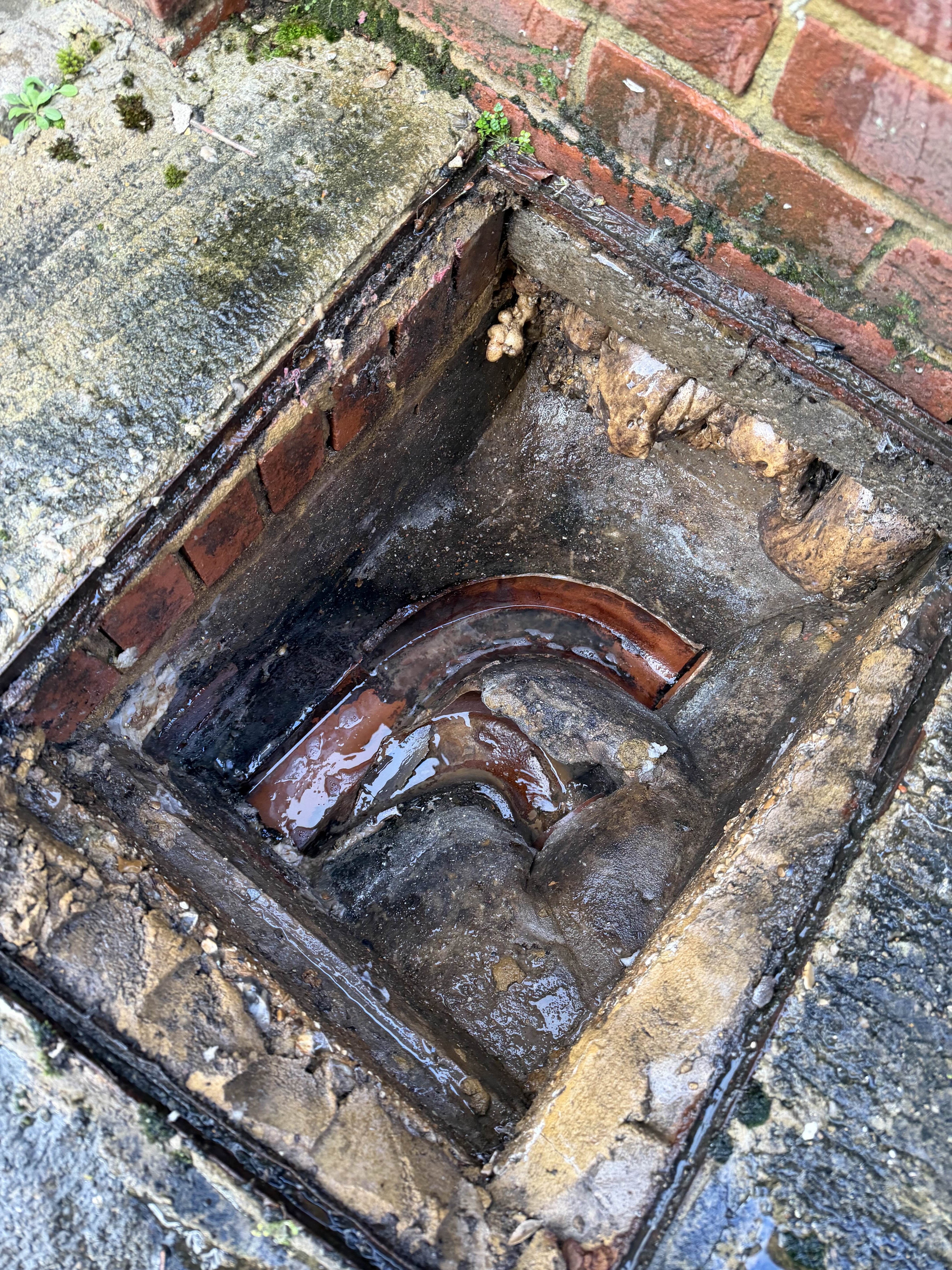 High pressure drain jetting clearing blockage